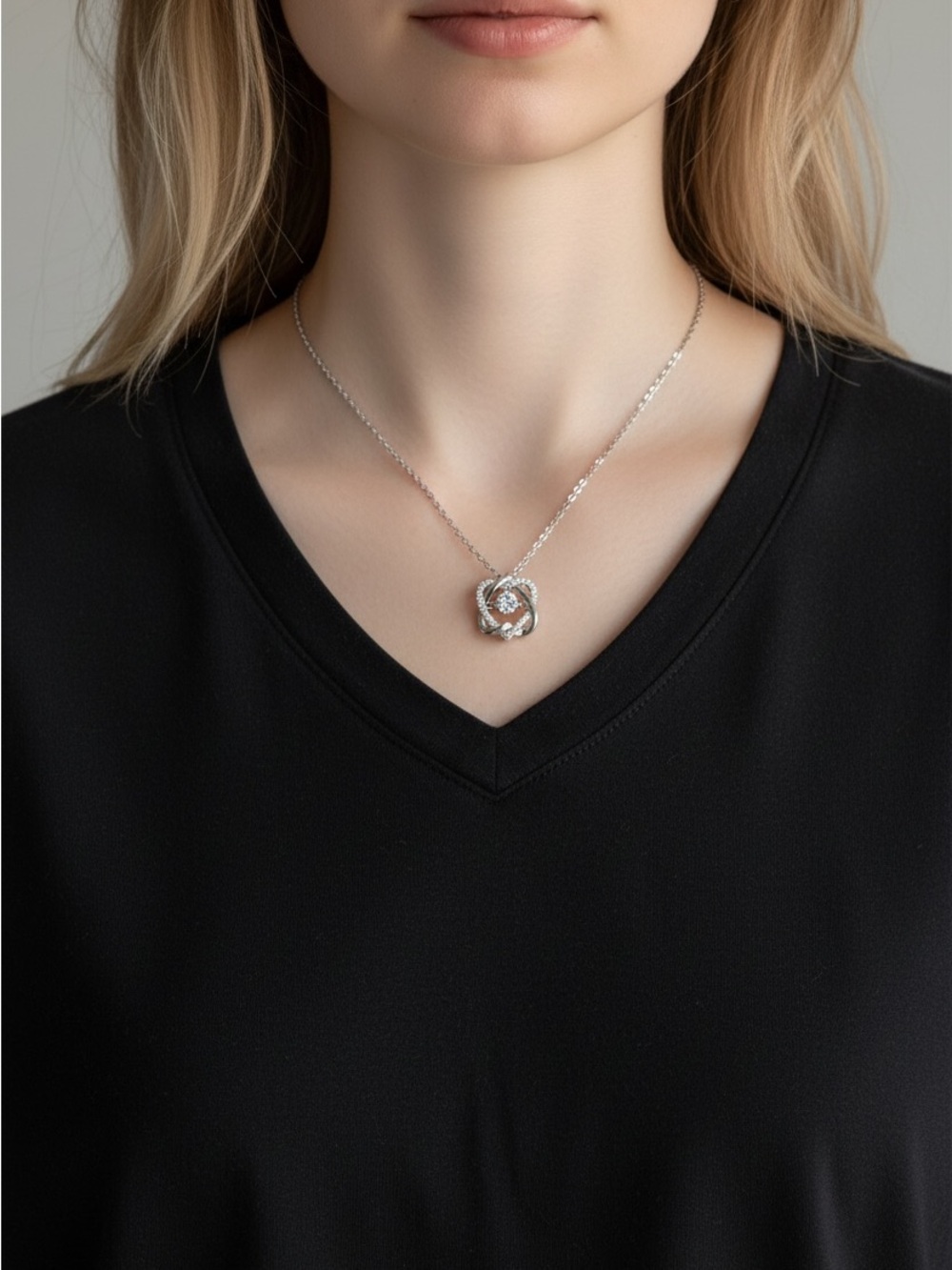 9/20 Silver Floral Knot Pendant Necklace - White Crystal Accent